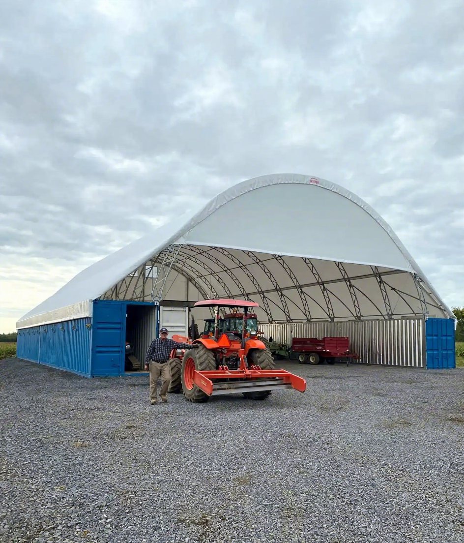 Red fabric building with open sidewall