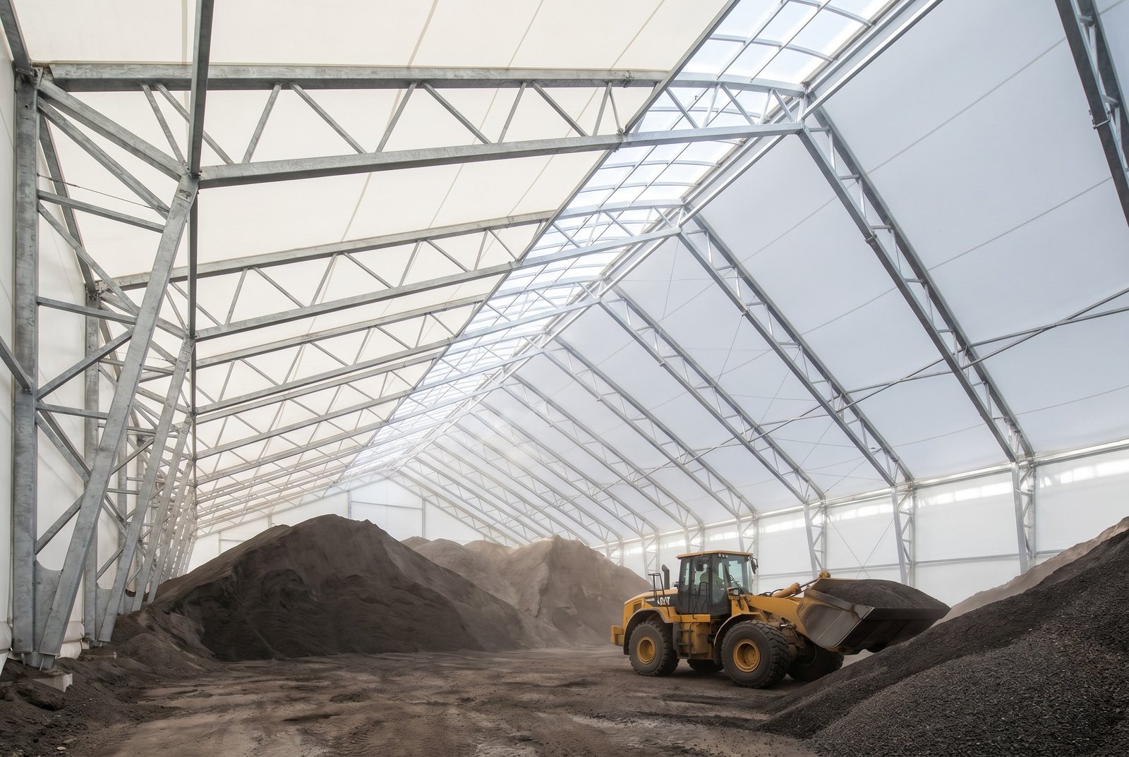 Ore storage fabric building